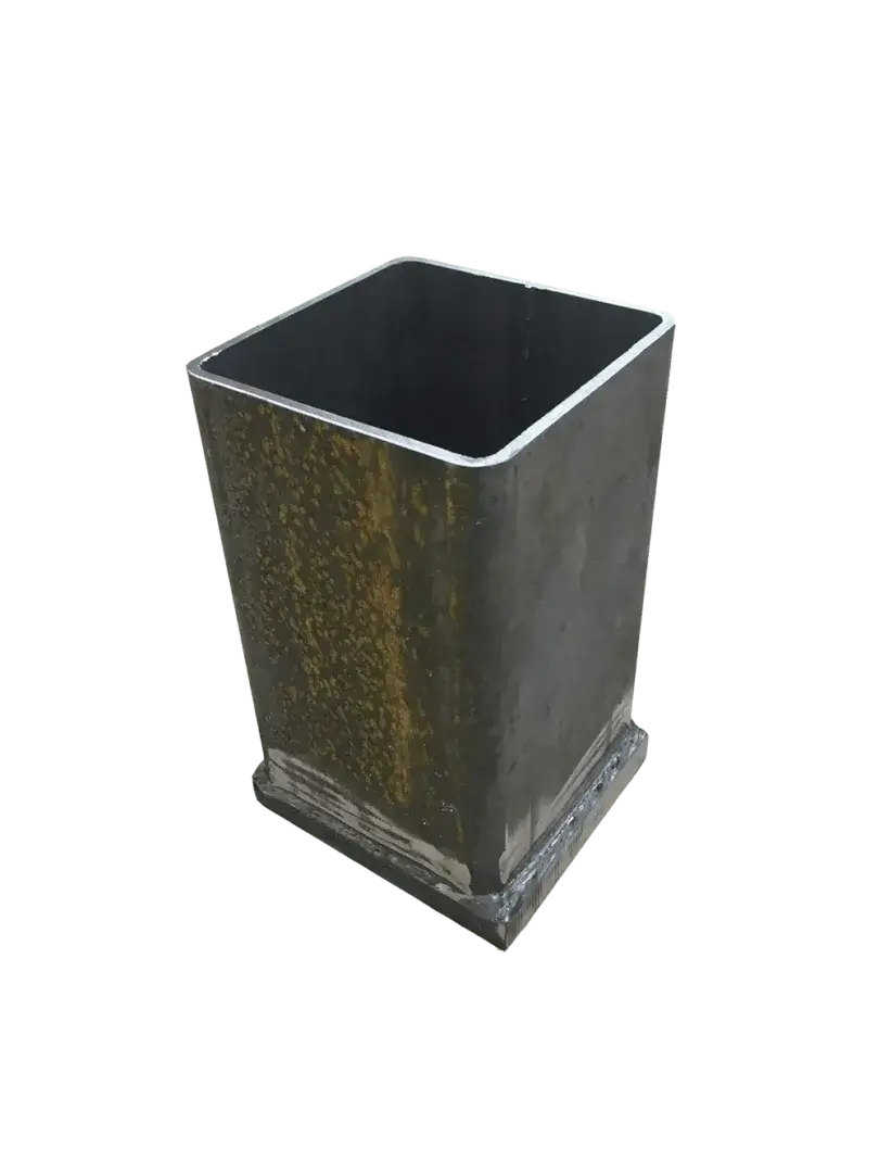 The 4x4 Post Driving Cap is a square, open-top metal tool with a weathered finish and solid base, shown on a white background.