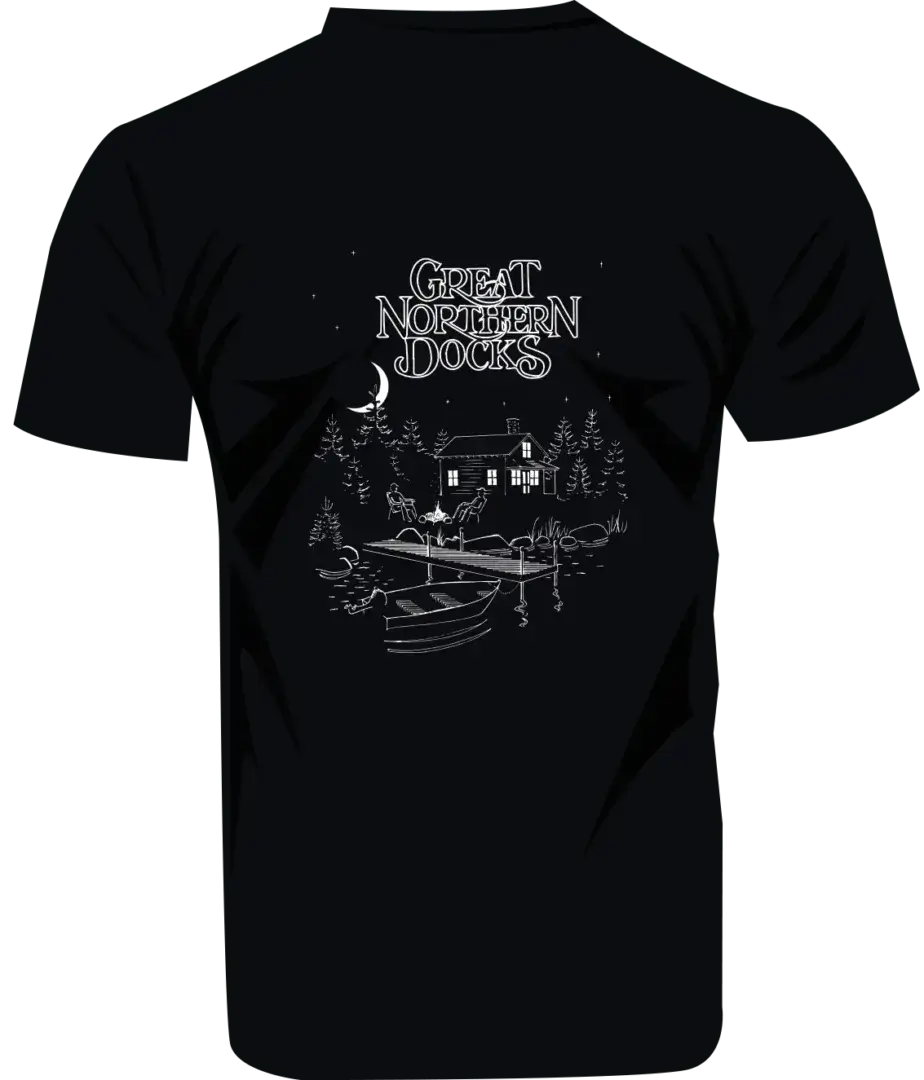 Black T-Shirt - GND: Features a white night scene of a lakeside cabin, boat, and trees with "Great Northern Docks" text, inspired by classic Maine docks.