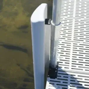 The Guardian Bumper with Pipe Bracket is a white dock bumper mounted on a metal dock in clear water, perfect for Maine docks with visible underwater rocks or plants.