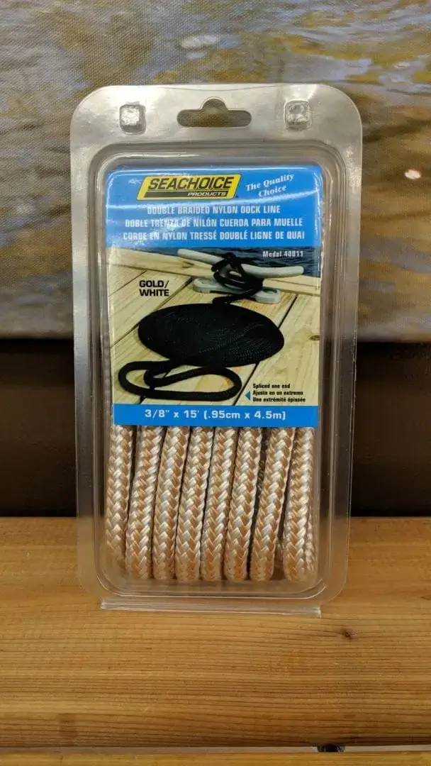 A Dock Line (2 Pack) in gold and white, double braided nylon, 3/8 x 15 ft—ideal for Maine docks—displayed on a wooden surface.