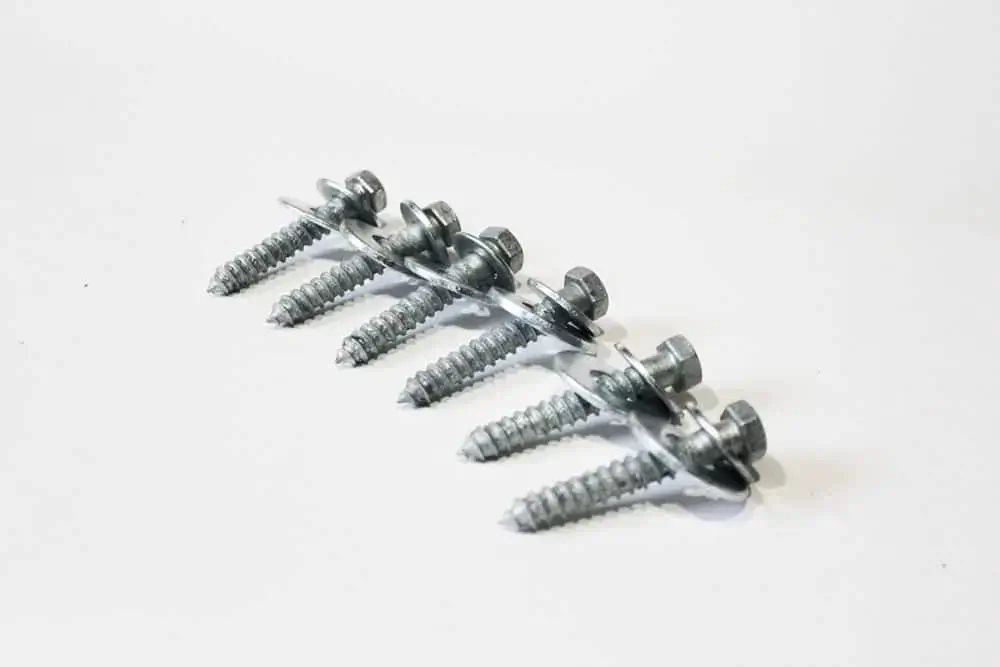 Six screws connected by a plastic strip from the Dock Float Attachment Kit (Air Filled), ideal for Maine Docks or Great Northern Docks projects.