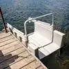 Z6H4673 A Kayak Launch - Connect-A-Dock sits partially submerged on a Great Northern Docks wood dock, providing accessible entry to the lake.