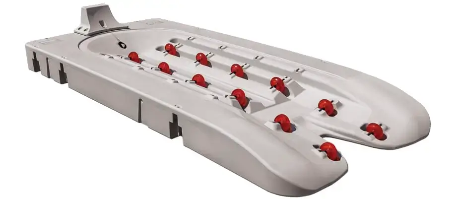 The Connect-A-Dock is a white floating dock section with a molded groove and red rollers for easy launching and docking of personal watercraft.